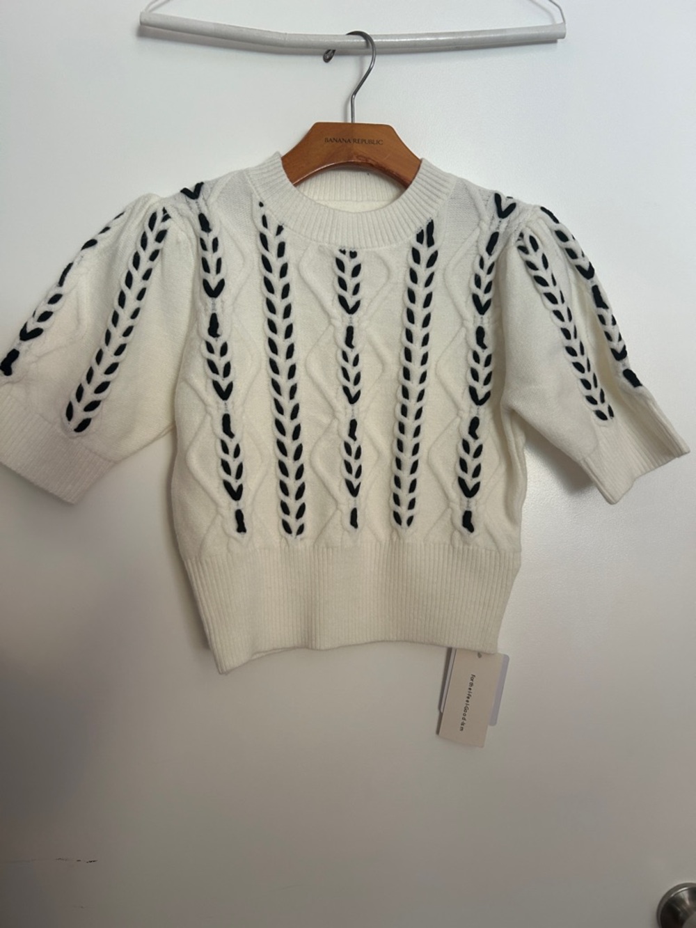 Commense Cream Knit Top with Black Logo Tag